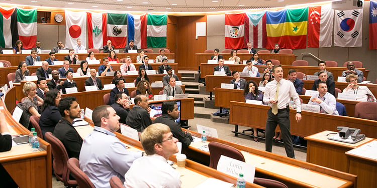 Ethan Bernstein leads an HBX case discussion in a classroom on the Harvard Business School campus