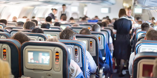 Full rows of passengers on an airplane